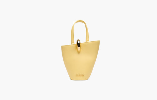 The Small Bambola Asymmetric Bucket Bag "Light Yellow"